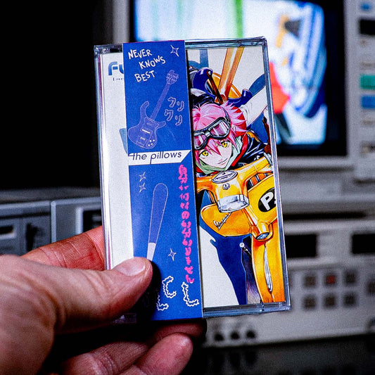 FLCL Cassette Ultimate Edition Pre Order — cassette with J-card — J-card front cover — VCR Zone