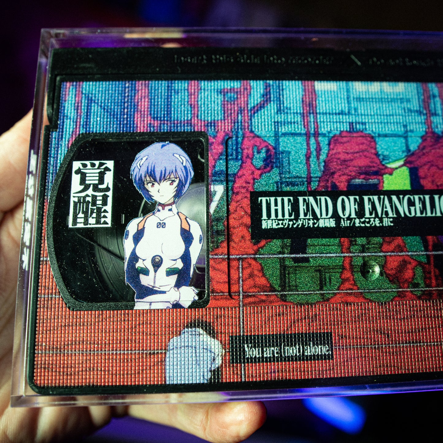 End of Evangelion VHS w/ Acrylic Case Pre-Order — cardboard sleeve — detail of artwork — VCR Zone