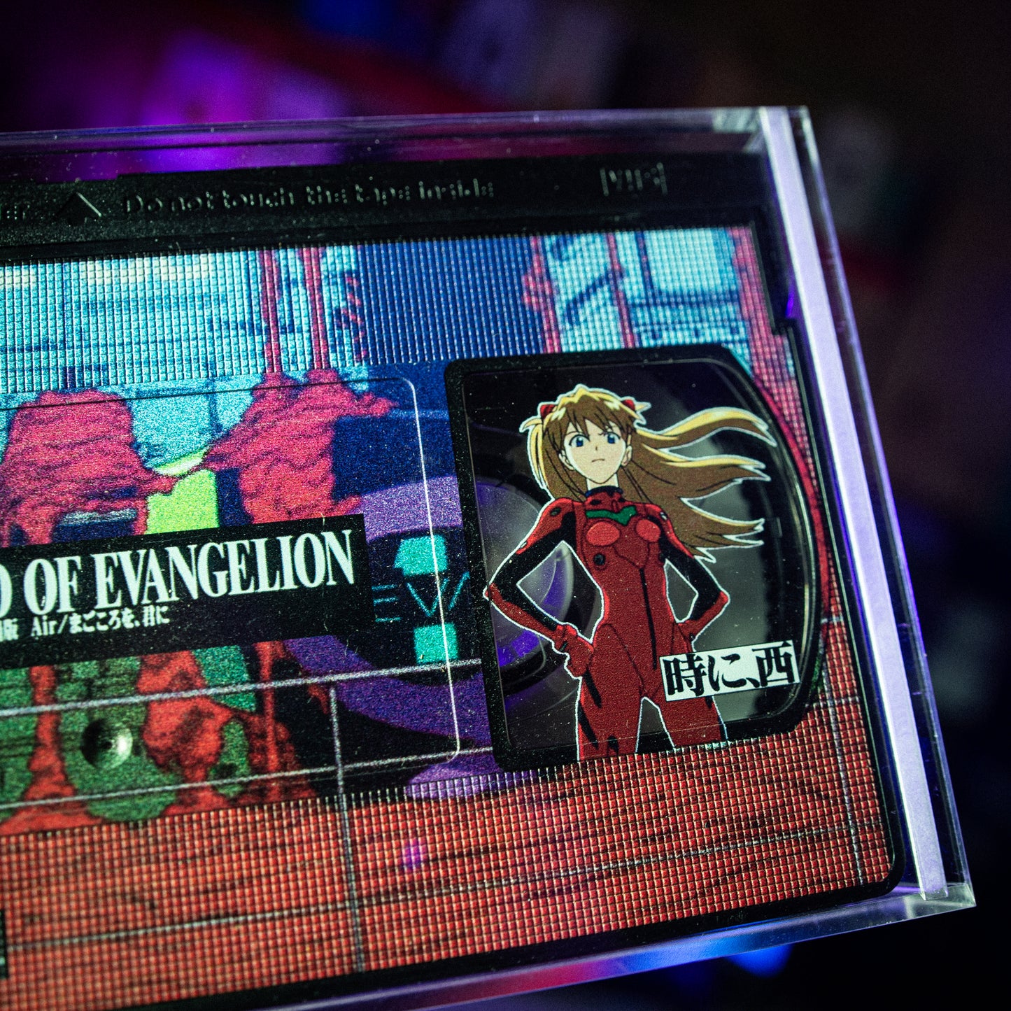 End of Evangelion VHS w/ Acrylic Case Pre-Order — cardboard sleeve — front cover artwork — VCR Zone