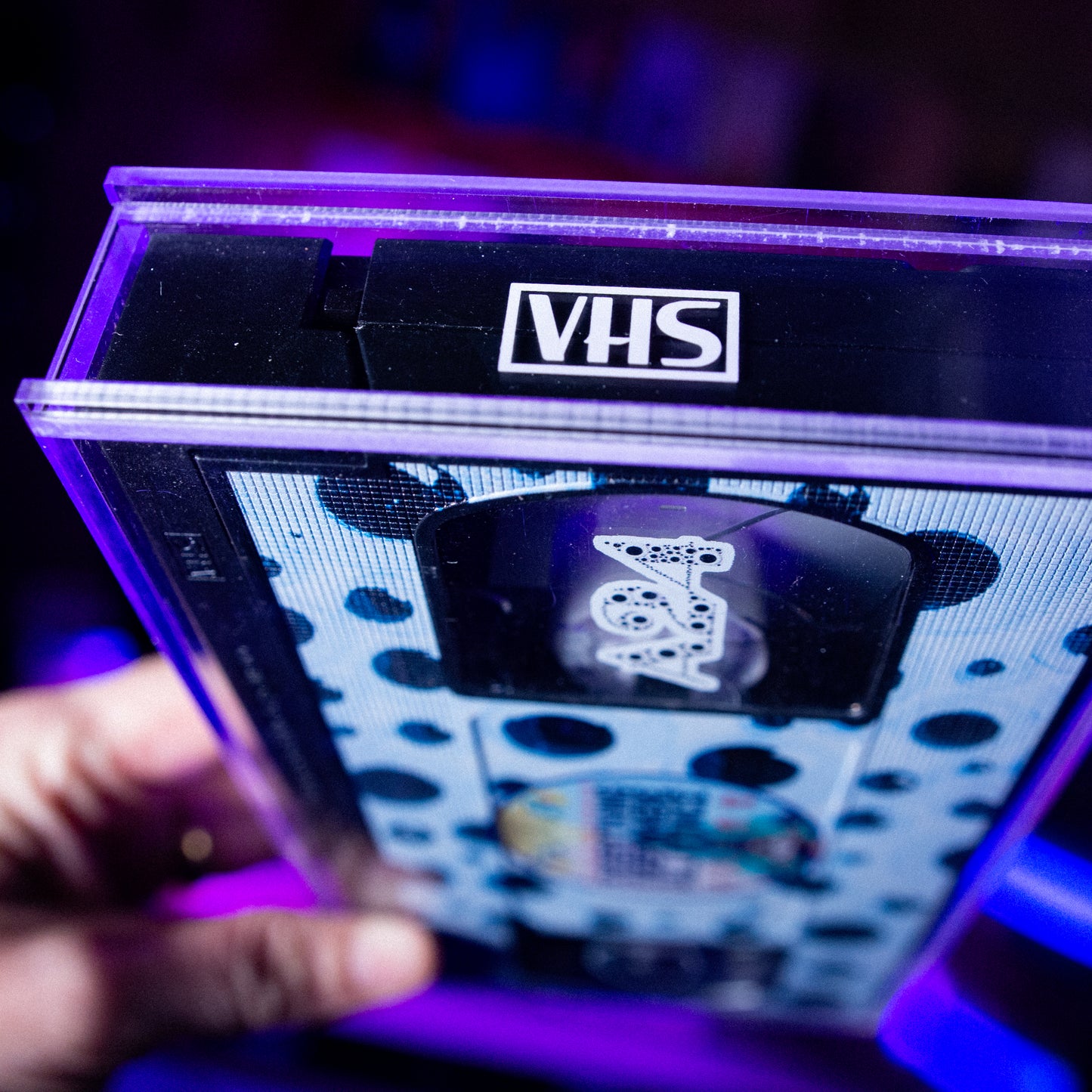 EEAAO VHS w/ Acrylic Case Pre-Order — cardboard sleeve — close-up of tape label with sleeve — VCR Zone