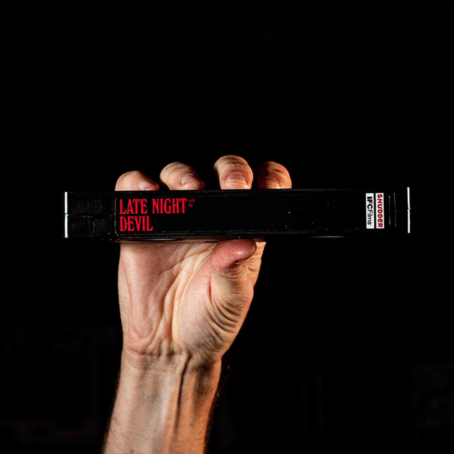 Late Night with the Devil on VHS — cardboard sleeve — close-up of tape label with sleeve — VCR Zone