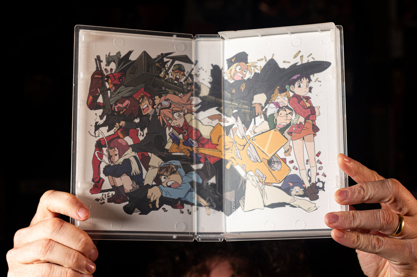 FLCL Limited Edition on VHS Pre Order — clamshell — close-up of tape label with sleeve — VCR Zone