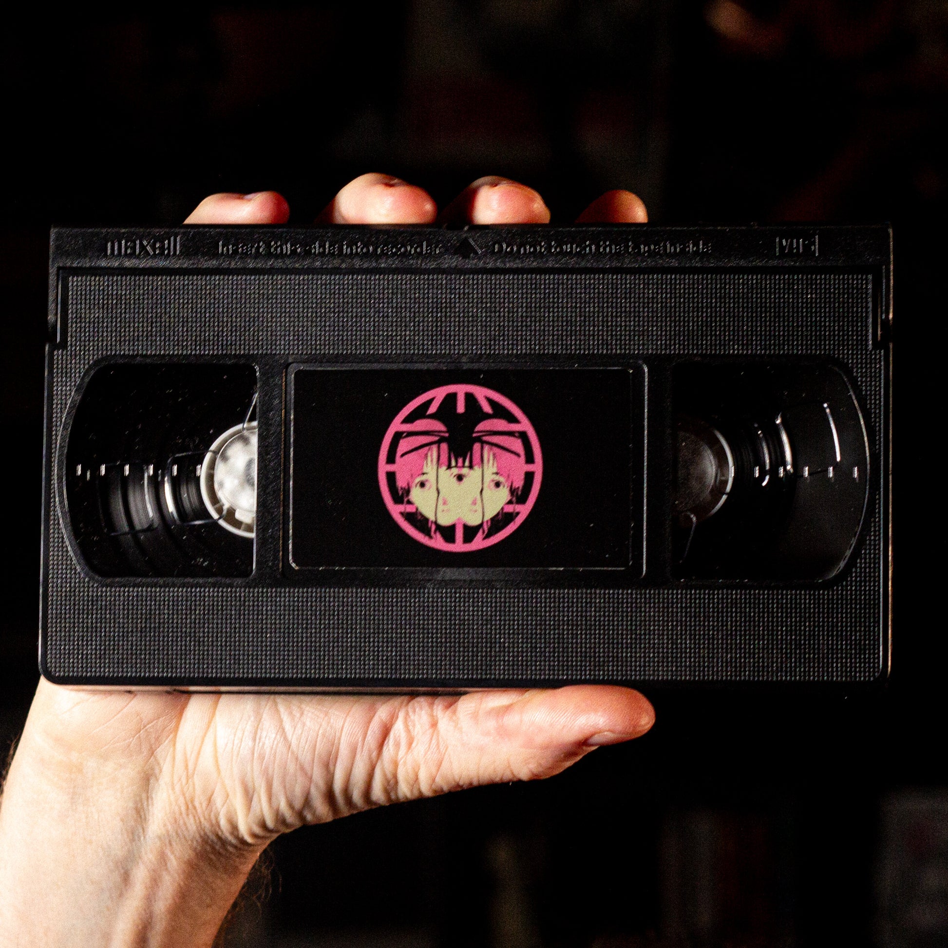 Serial Experiments Lain VHS Box Set — cardboard sleeve — alternate angle of sleeve and tape — VCR Zone