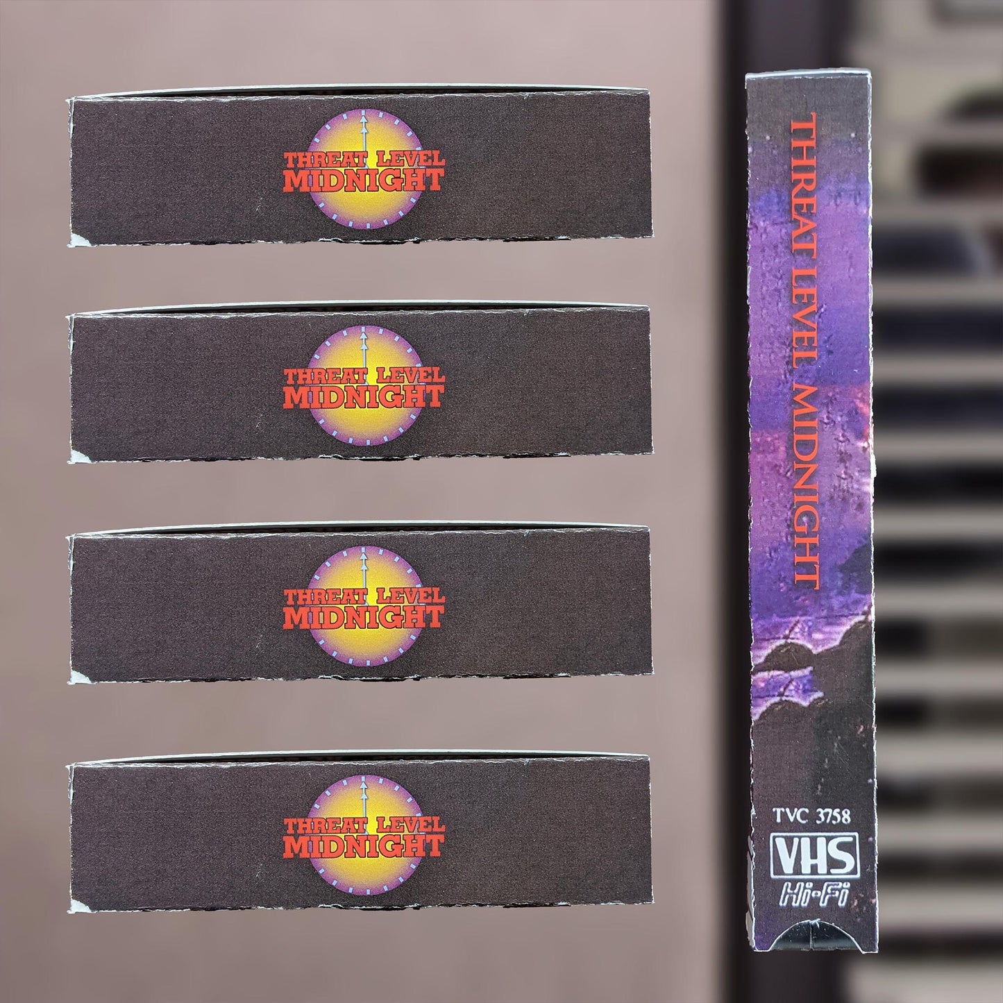 Threat Level Midnight VHS — cardboard sleeve — angled view showing sleeve spine title — VCR Zone