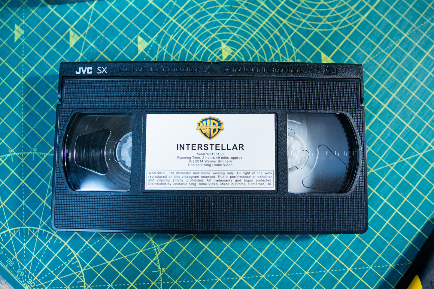 Interstellar VHS — cardboard sleeve — close-up of tape label with sleeve — VCR Zone