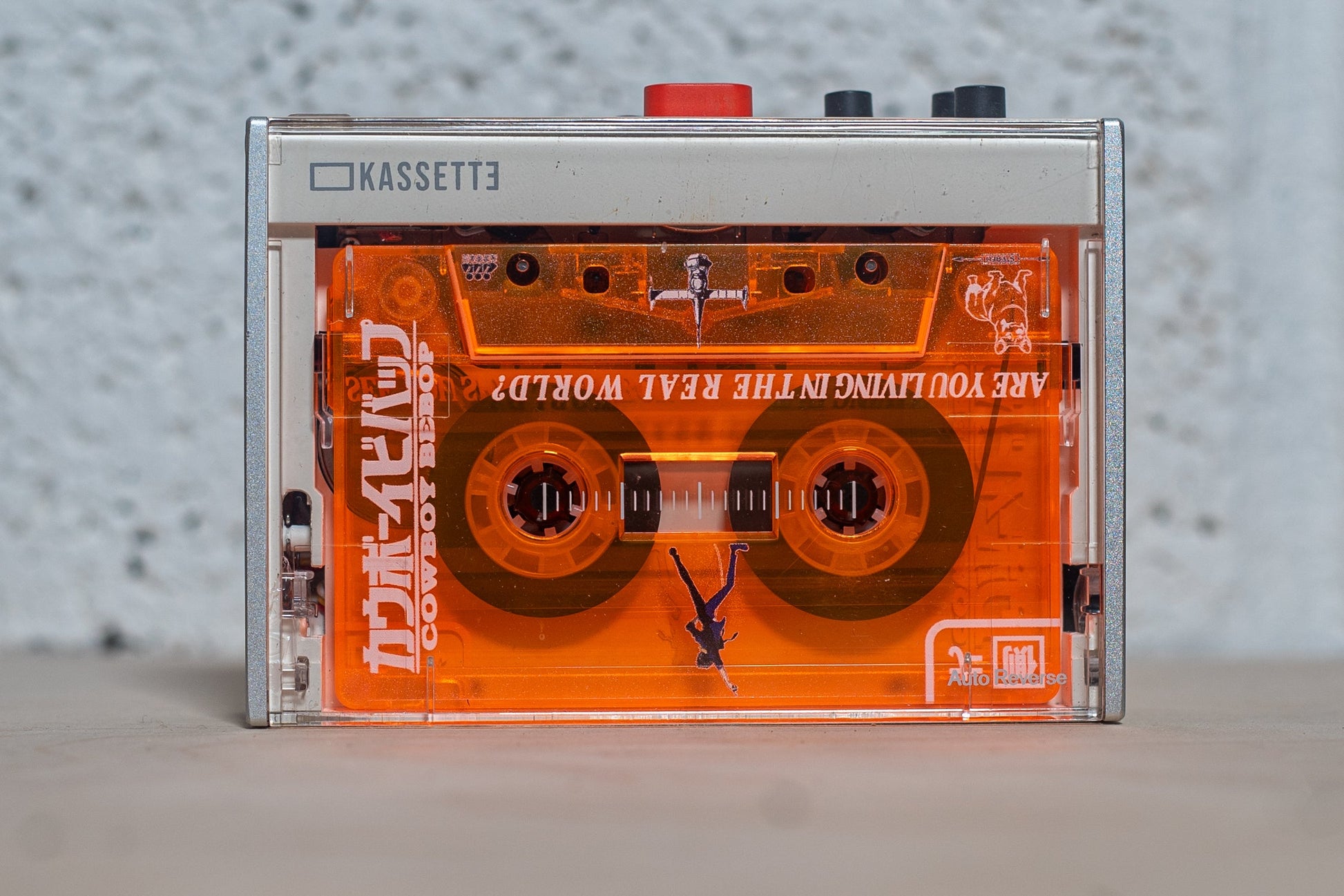 Cowboy Bebop Cassette  with cassette inside player.